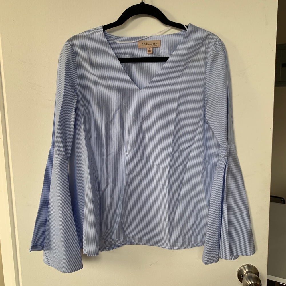 Blue and white striped blouse with bell sleeves